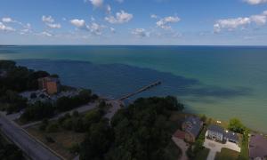 Rocky River WWTP & Bradstreet Landing in Lake Erie, looking North, Summer 2019. </br>Rocky River, Ohio </br>Great Lakes Water in Action. Nicholas Barille.