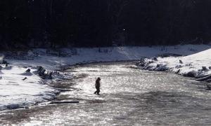 Photo of Frank Dituri in Boardman Ottaway River performing depth of refusal measurements for the removal of Brown Bridge Dam. </br>Traverse City, Michigan </br>Research, Education & Science. Frank Dituri.