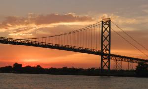 Ambassador Bridge at sunset. Taken on a dinner cruise just after it rained. Detroit, Michigan. Recreation. Rhonda Fadoir.