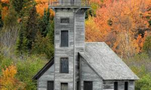 East Channel Lighthouse. Taken during a pictured rocks boat tour in the fall. Munising, Michigan. Recreation. Rhonda Fadoir.