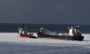The Canadian Coast Guard Ice Breaker Vincent Massey is clearing a path for the Great Lakes Freighter Algoma Intrepid carrying a load of Salt from Compass Minerals Salt mine in Goderich, The Tug Ocean SImard is following. It took about 2 hours to clear a path to open water. Goderich, Ontario. Great Lakes Water in Action. Dave Young.