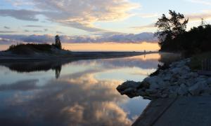 Mouth of the Two-Hearted River at Lake Superior. Early morning fishing. Michigan. Recreation. Randy Fretz.