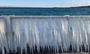 A view of the West Arm of Grand Traverse Bay in April 2024 after a night of heavy wind from the North. Taken at the Great Lakes Campus of Northwestern Michigan College. Traverse City, Michigan. Great Lakes Water in Action. Matt Hirsch.
