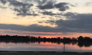 Sunset over the Pointe Mouillee State Game Area on the West Shore of Lake Erie. Brownstown Township in Wayne County, Michigan. Recreation. Richard Micka.