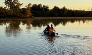 Two people in canoe heading out to collect samples. Leamington, Ontario. Research, Education & Science. Kayla Martin.