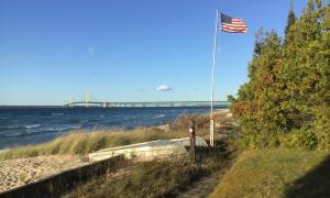 Looking out from lower Michigan to the mackinaw Bridge on a beautiful day! Mackinaw, Michigan. Great Lakes Water in Action. Margaret McGrady.  